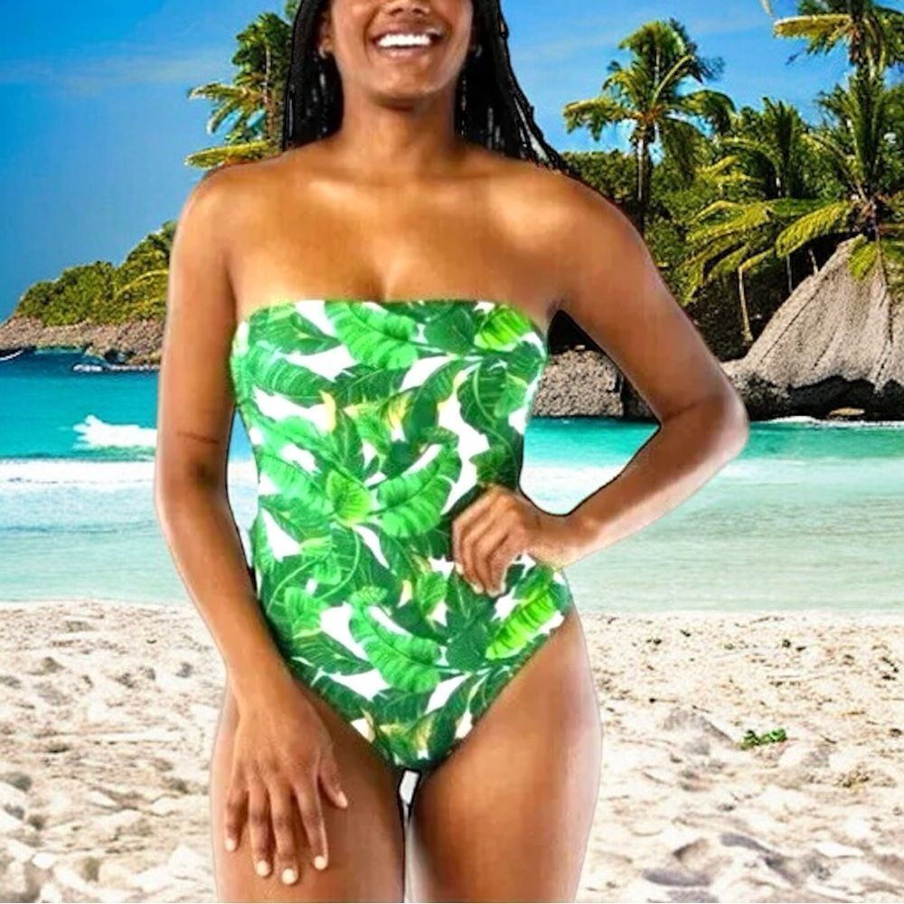 Love and sports awesome white with green tropical design one piece suit!